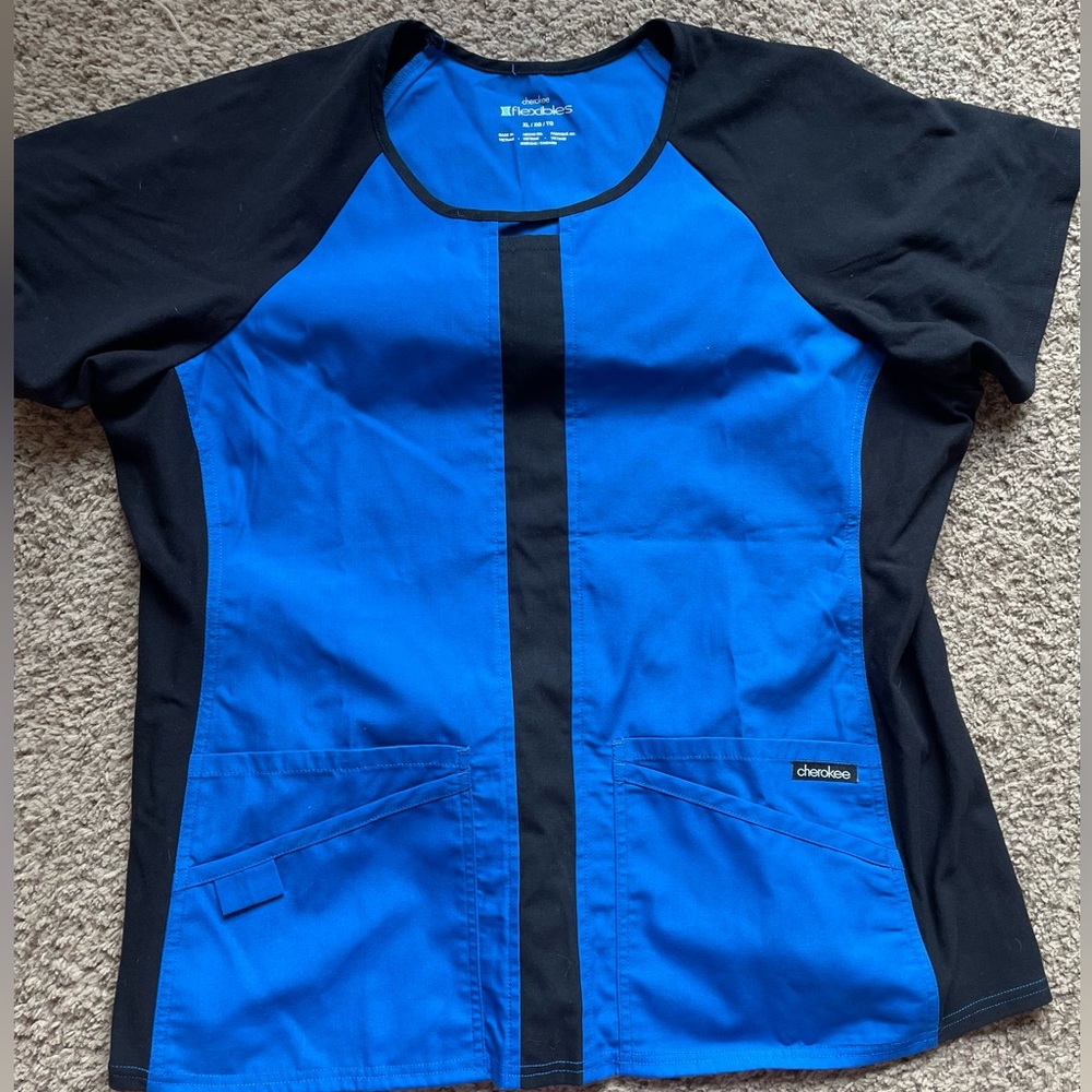 Black and blue women’s scrub top. Size XL. Cherokee